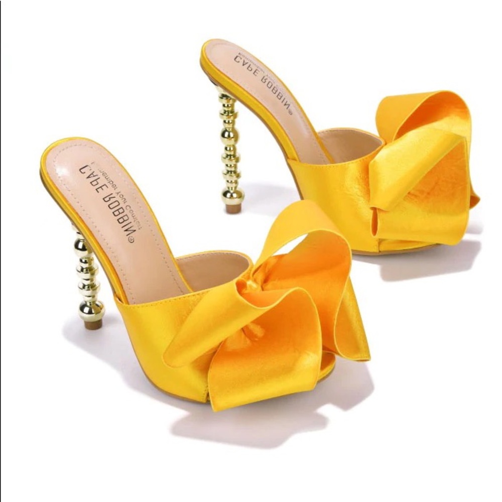 Yellow Mules with Bow tie and gold adorned heels